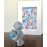 Тедді Статуетка з синьою коробочкою в лапках.