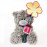 Медвежонок Тедди в коробочке и держит цветок